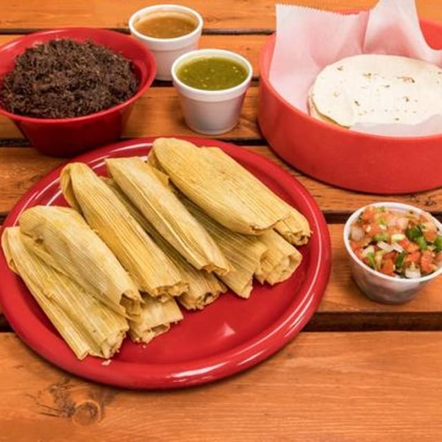1 Lb Barbacoa, 10 Flour Tortillas, 1 Salsa (4 Oz), Handmade Tamales (1 Dozen).